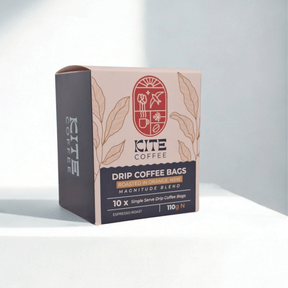 Box of Kite Coffee branded coffee drip bags on a white background